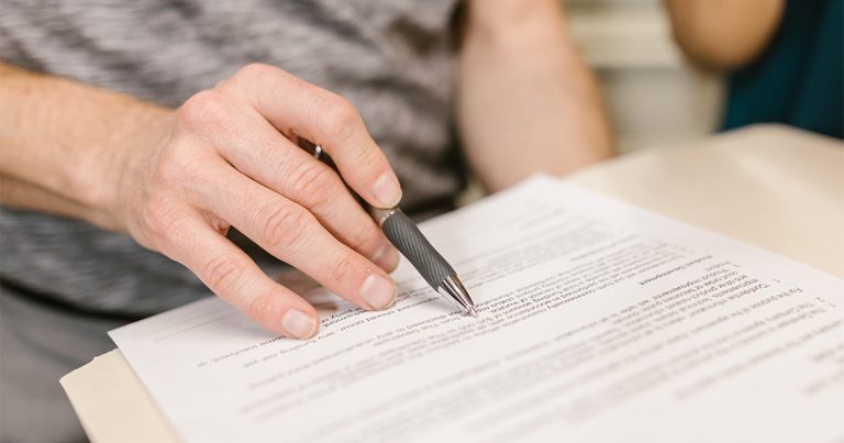 Person signing a document