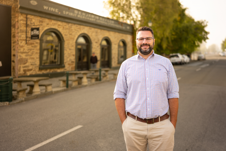 Eugene Roud pictured in an outdoor setting.