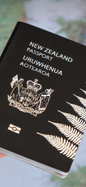 New Zealand passport and Europe map stock photo