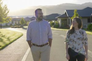 AWS Residential page banner, staff members standing in street