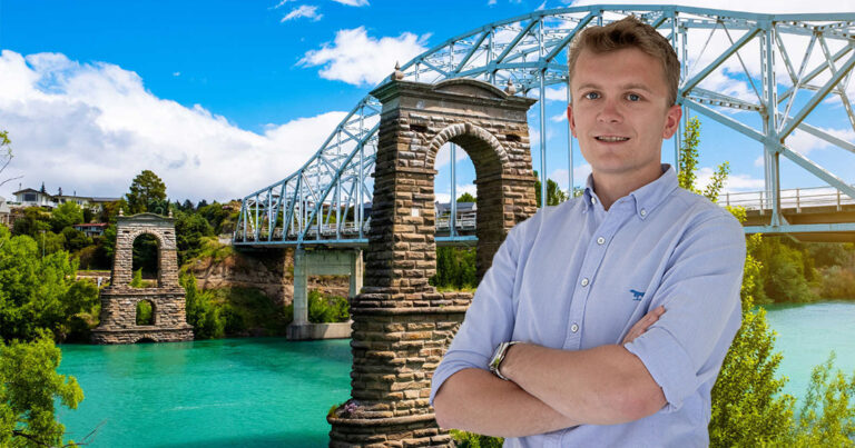 Harry superimposed over shot of Clutha River with historical arches and bridge in background